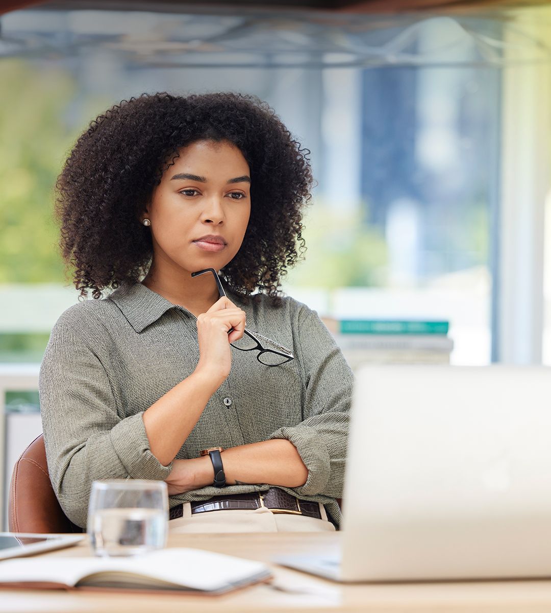 IT manager reviewing systems at her desk