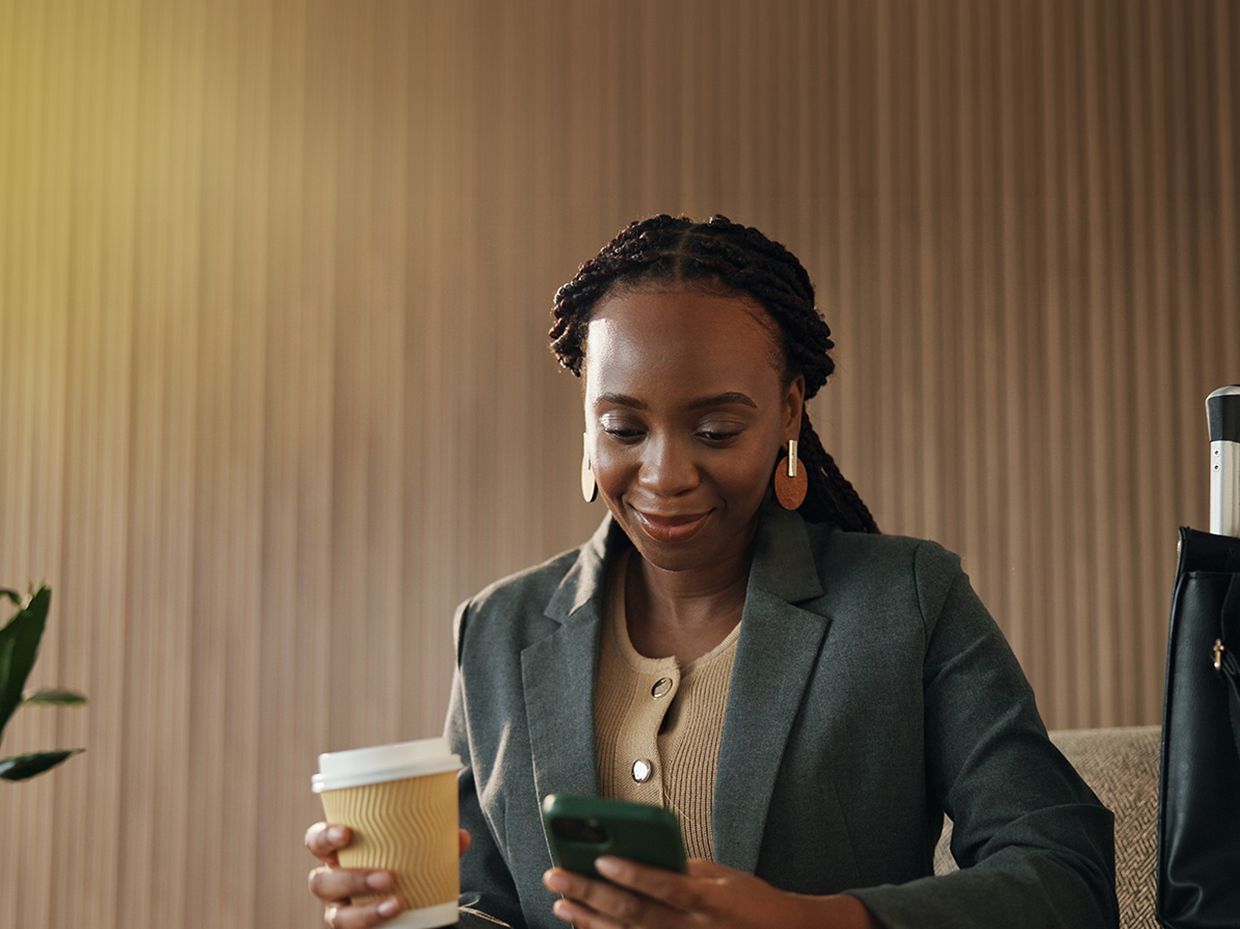 Business professional checking her phone